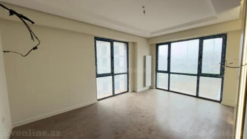 Satılır 2 otaqlı Mənzil Yeni tikili 70 m² Bakmil m. - şəkil 2