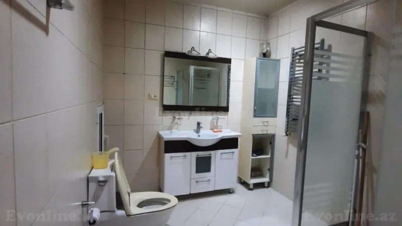 Kirayə verilir 3 otaqlı Mənzil Yeni tikili 160 m² Nərimanov r. - şəkil 16