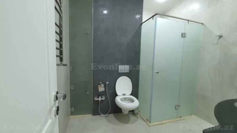 Kirayə verilir 4 otaqlı Mənzil Yeni tikili 200 m² Nərimanov r. - şəkil 16