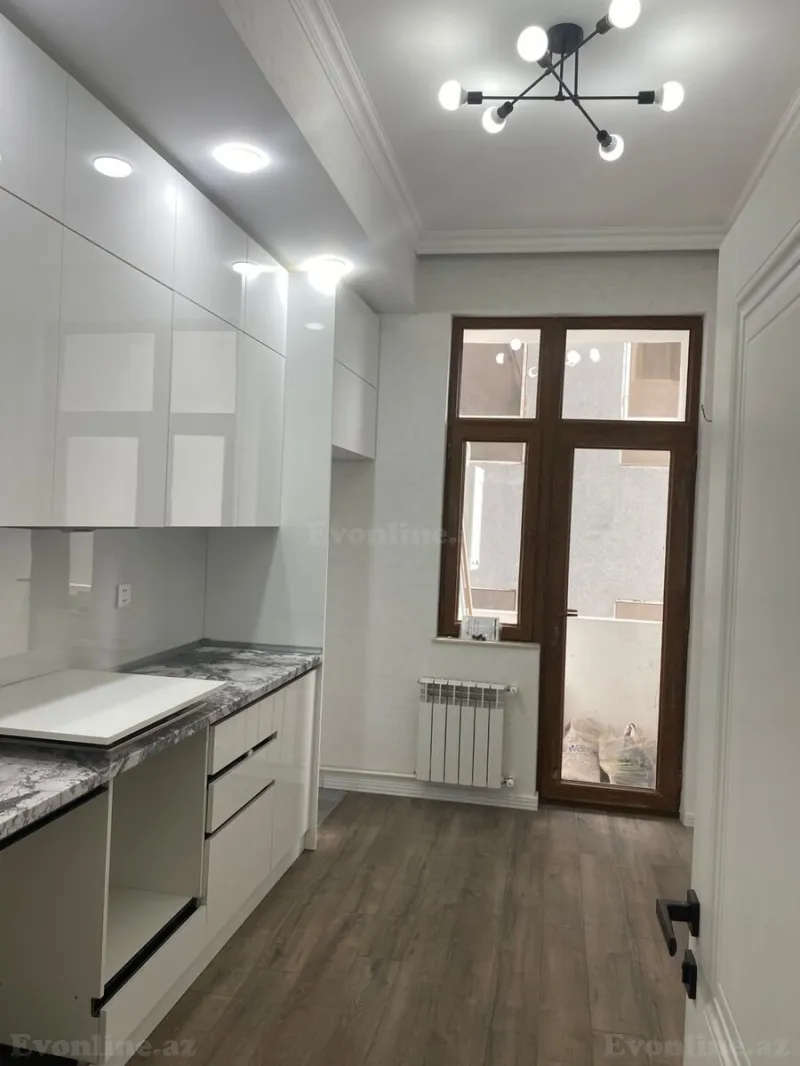 Satılır 2 otaqlı Mənzil Yeni tikili 74 m² İnşaatçılar m. - şəkil 2
