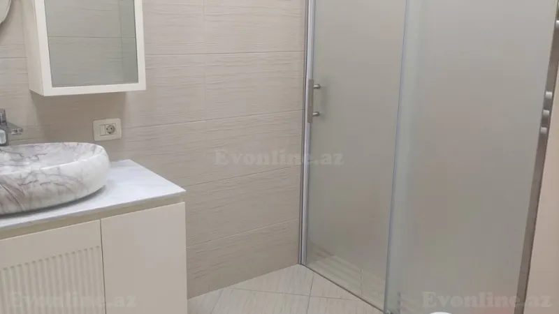 Kirayə verilir 3 otaqlı Mənzil Yeni tikili 130 m² Nəsimi r. - şəkil 7