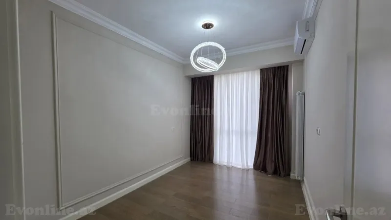 Kirayə verilir 4 otaqlı Mənzil Yeni tikili 130 m² Bakmil m. - şəkil 2