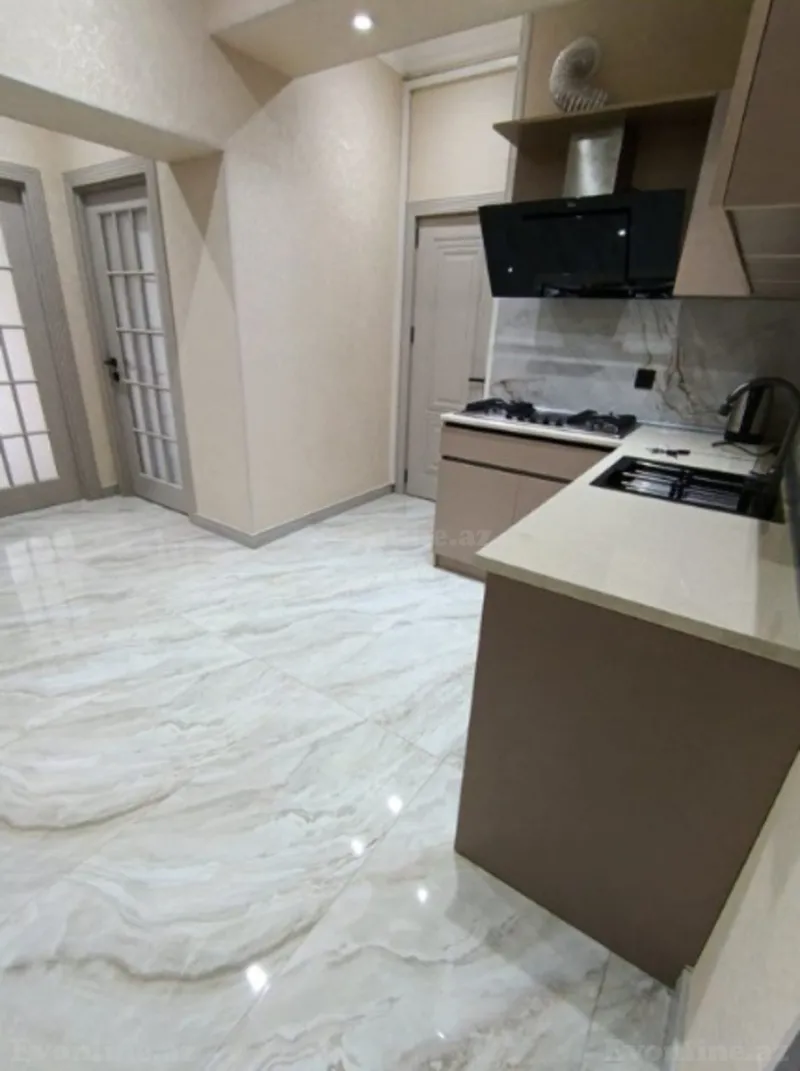 Kirayə verilir 2 otaqlı Mənzil Yeni tikili 74 m² Nizami r. - şəkil 2