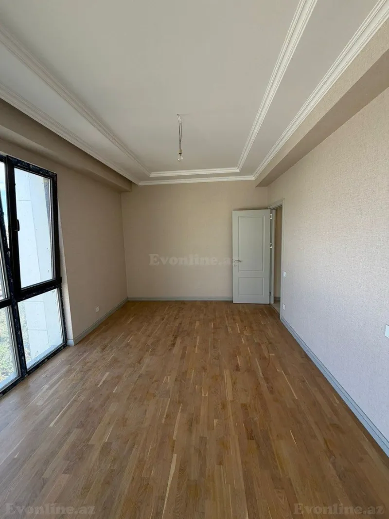Satılır 2 otaqlı Mənzil Yeni tikili 70 m² 2-ci mikrorayon - şəkil 2