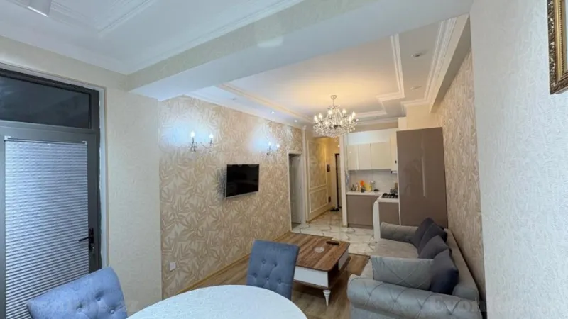 Kirayə verilir 2 otaqlı Mənzil Yeni tikili 70 m² 28 May m. - şəkil 2