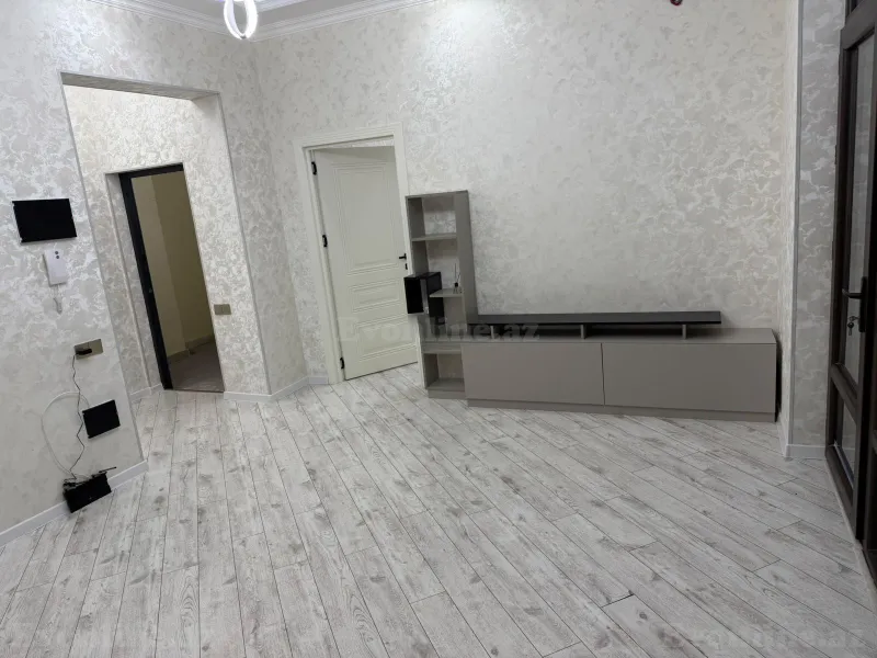 Kirayə verilir 2 otaqlı Mənzil Yeni tikili 65 m² İnşaatçılar m. - şəkil 2