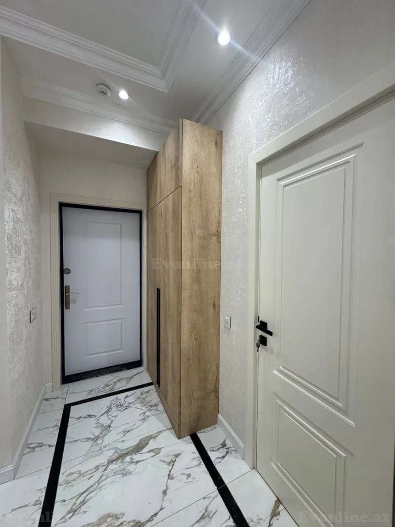 Kirayə verilir 2 otaqlı Mənzil Yeni tikili 55 m² İnşaatçılar m. - şəkil 2