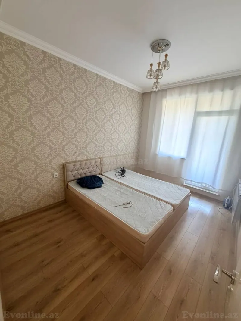 Kirayə verilir 2 otaqlı Mənzil Yeni tikili 65 m² İnşaatçılar m. - şəkil 2