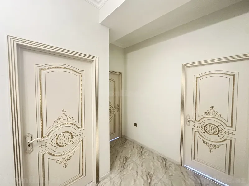 Satılır 2 otaqlı Mənzil Yeni tikili 70 m² Binəqədi - şəkil 2